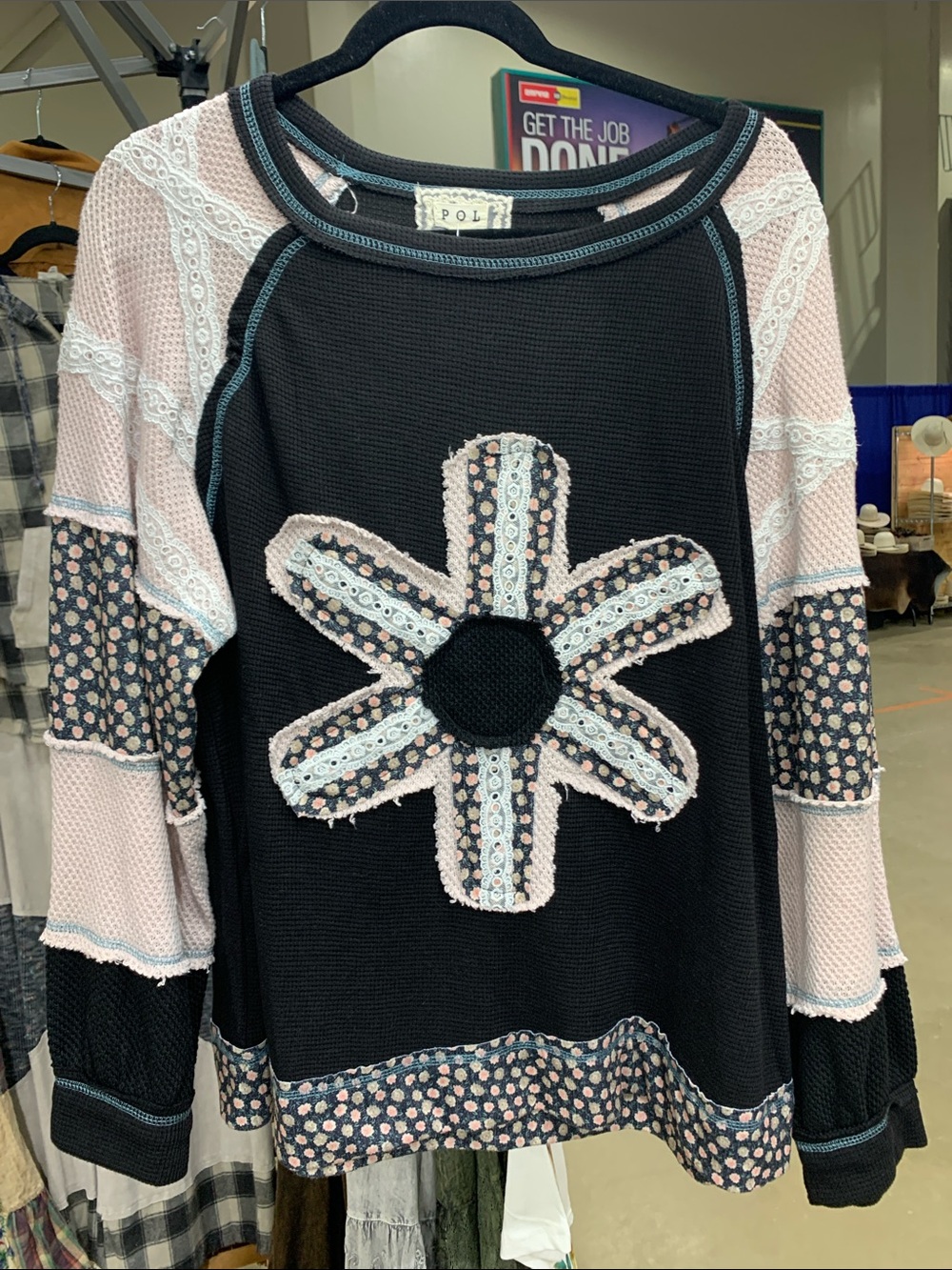 POL Black oversized Sweatshirt with Blush Flower Appliqué.